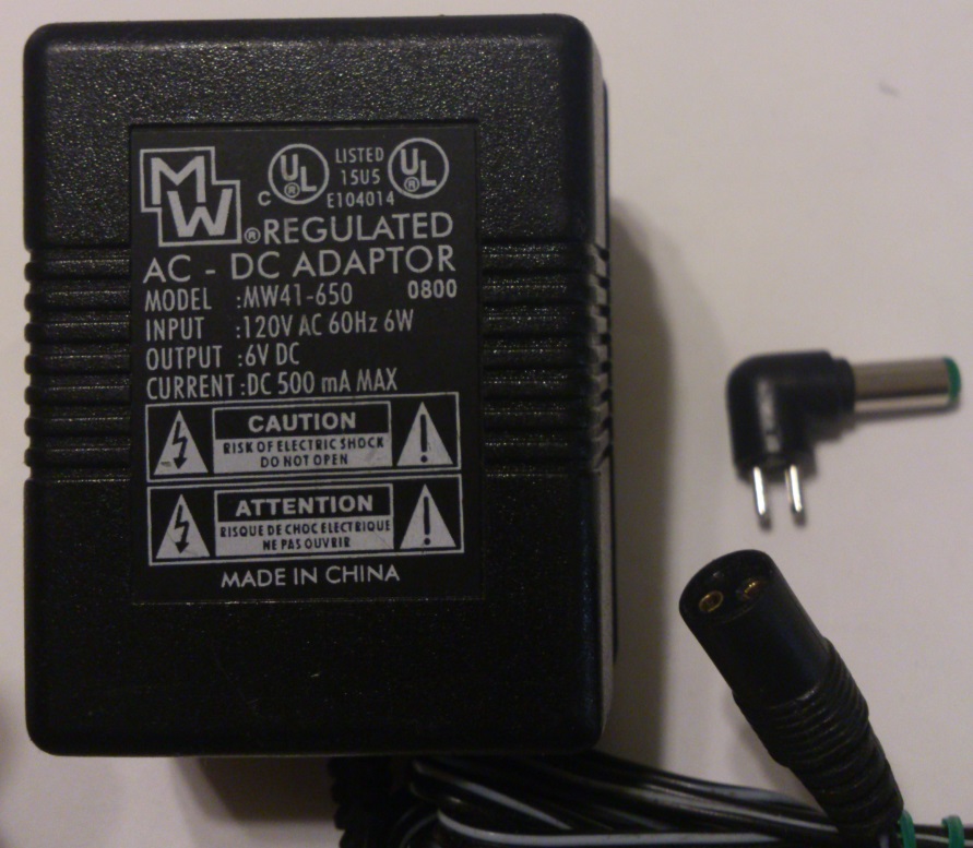 MW MW41-650 AC ADAPTER 6VDC 500mA USED 2x5.5x12mm -(+)-