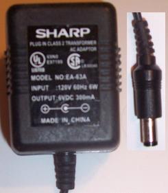 SHARP EA-63A AC ADAPTER 6VDC 300mA +(-) 2x5.5mm 120vac Power sup